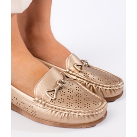 Mocassins dorés pour femme