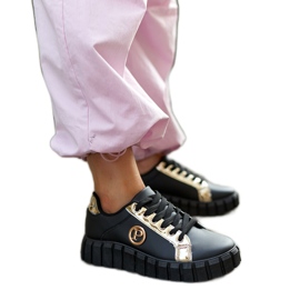 Baskets noires et dorées à semelle massive Bionda