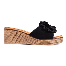 Mules compensées en daim noir