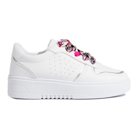Baskets femme blanches nouées avec un ruban