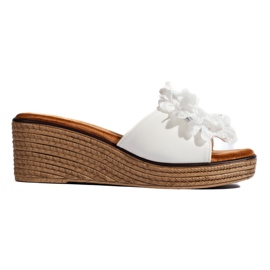 Mules compensées en daim blanc blanche