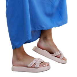 Chaussons en caoutchouc beige de Ferrei