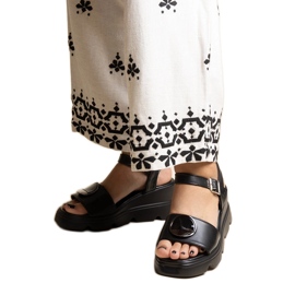 Sandales compensées noires en cuir écologique Maddison