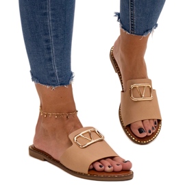 Tongs beiges avec boucle Mariza