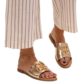 Tongs dorées ornées d'une boucle Perkin