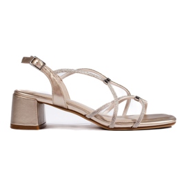 Sandales dorées pour femmes à brides décoratives de Sergio Leone