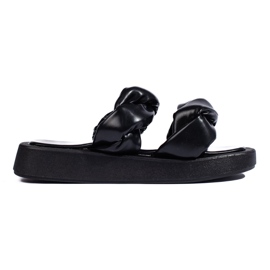 Tongs noires à semelle épaisse le noir