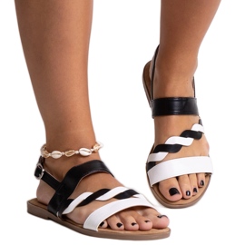 Sandales en éco-cuir blanches et noires par Asfoure Sandales en éco-cuir blanches et noires par Asfoure