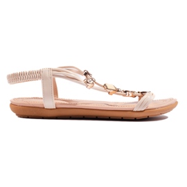 Sandales plates femme beiges avec décorations