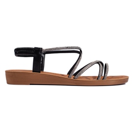 Sandales slip-on noires avec strass le noir