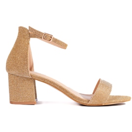 Sandales à talons dorées à paillettes d'or Sandales à talons dorées à paillettes d'or