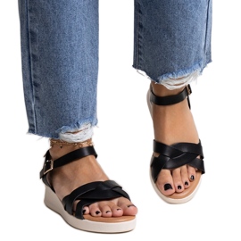 Sandales compensées basses noires de Khalid le noir