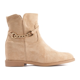 Bottes femme beiges avec une chaîne