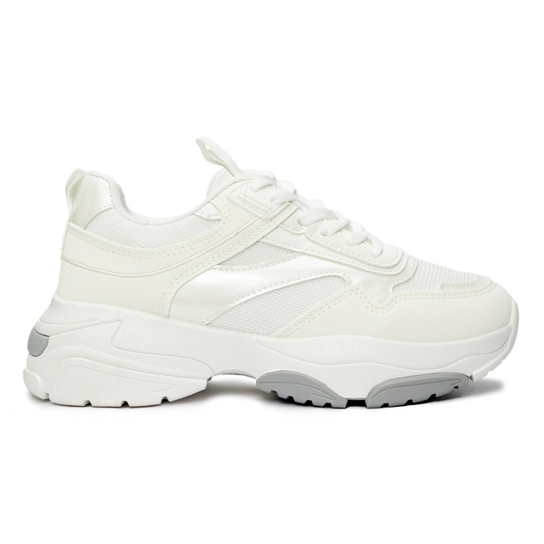 Chaussures de sport blanches à semelle épaisse