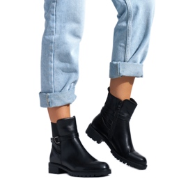 Bottines noires pour femme avec boucle décorative le noir