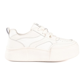 Chaussures de sport blanches pour femmes à semelle haute