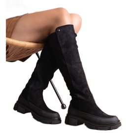 Bottines noires sur talon massif, Muguet