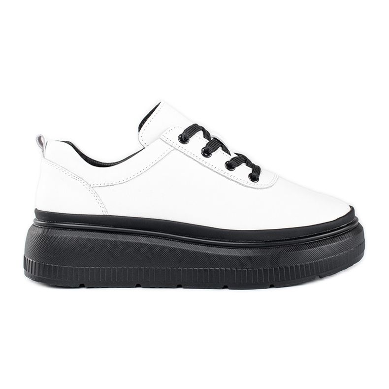 Chaussures blanches en cuir sur plateforme noire