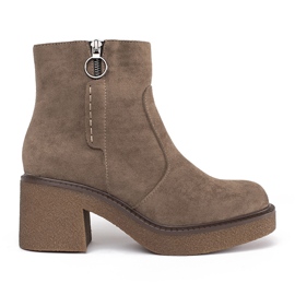 Bottines à talons en daim beige par Sergio Leone