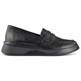 Chaussures classiques en cuir noir pour femmes sur une plateforme confortable