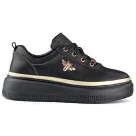 Baskets femme en cuir noir avec accessoires dorés le noir