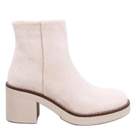 Eliza Bottines en daim beige à talons larges