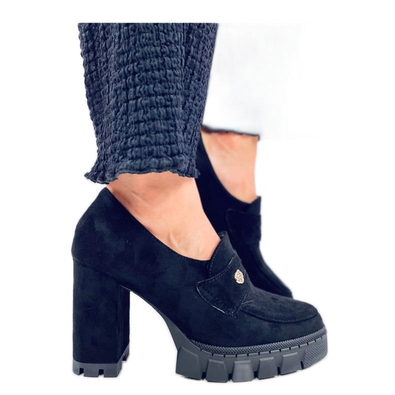 Mocassins noirs à talons hauts et plateforme le noir