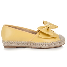 Vices Espadrilles sur la plate-forme avec un arc jaune