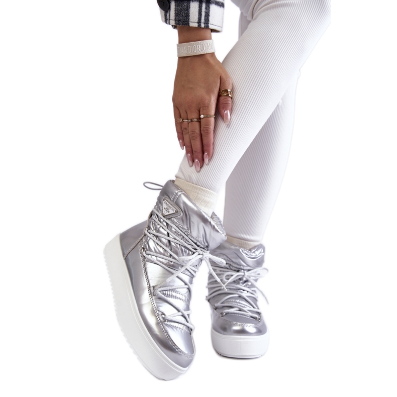 Boots de neige plateforme à lacets argentées Femme gris