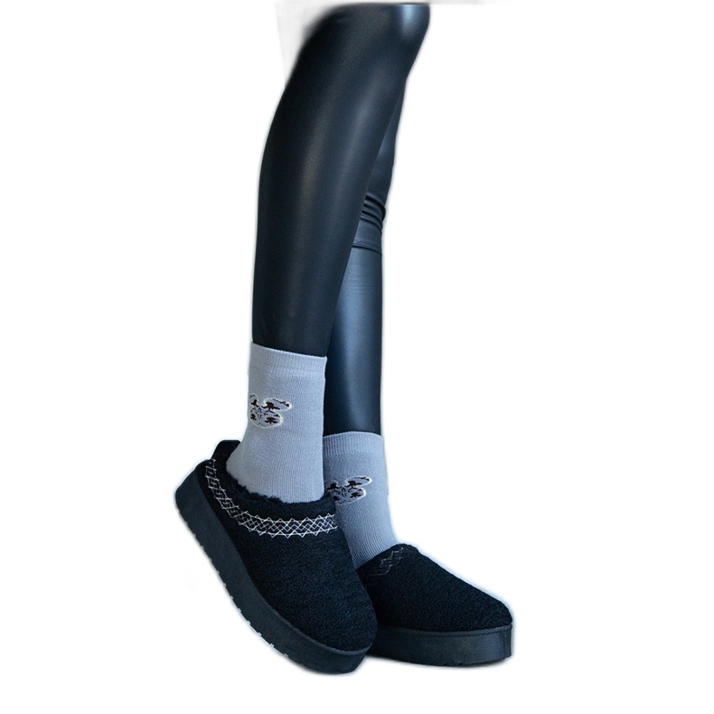 Boots de neige à plateforme noires avec tige basse et motif Greene brodé le noir Boots de neige à plateforme noires avec tige basse et motif Greene brodé le noir
