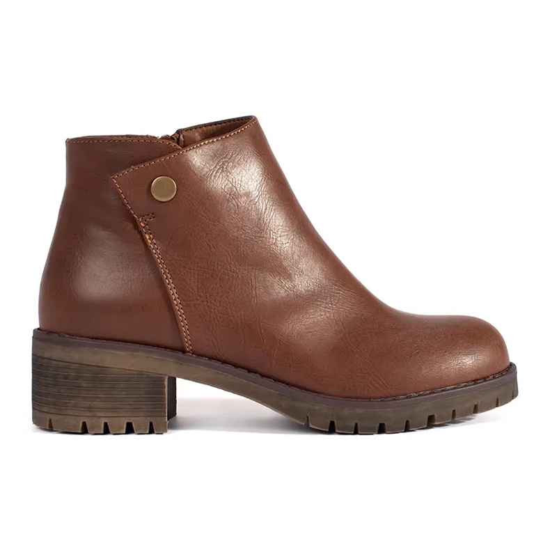 Bottes marron isolées en éco-cuir brun Bottes marron isolées en éco-cuir brun