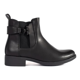 Bottines Chelsea noires classiques à talon plat le noir