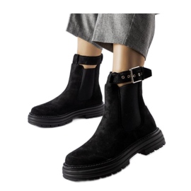 Bottines noires avec fermoir décoratif le noir