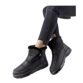 Bottes de neige isolées noires avec fermeture éclair le noir Bottes de neige isolées noires avec fermeture éclair le noir