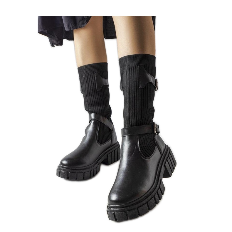 Bottes élégantes noires avec une tige élastique le noir Bottes élégantes noires avec une tige élastique le noir
