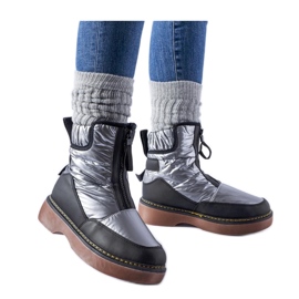 Bottes de neige isolées grises avec fermeture éclair le noir