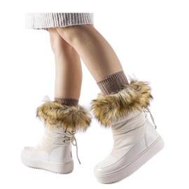 Bottes de neige beiges avec fourrure décorative Bottes de neige beiges avec fourrure décorative