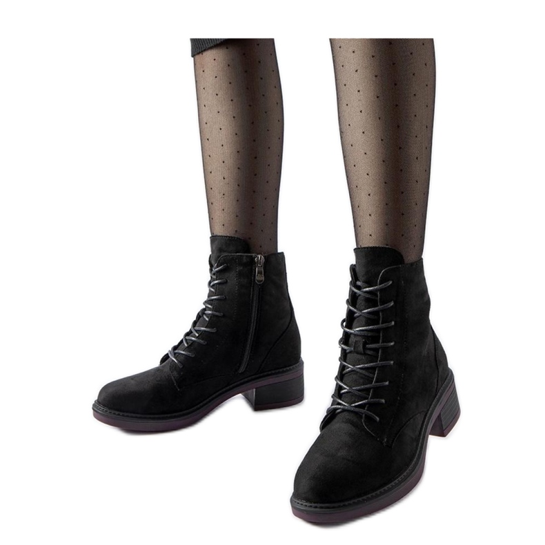 Bottines classiques noires à semelle violette le noir