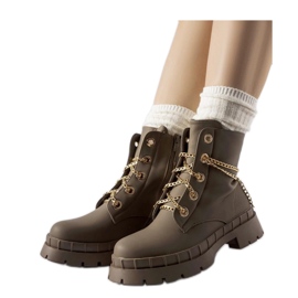 Bottes marron avec une chaîne brun Bottes marron avec une chaîne brun