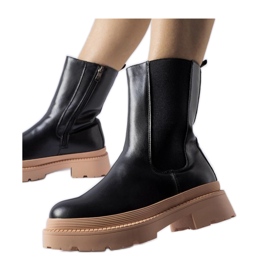 Bottines noires à semelle rose clair le noir