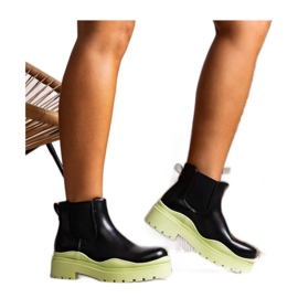 Bottines noires sur plateforme verte