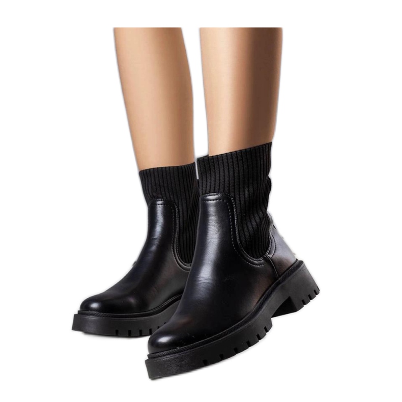 Bottes isolées noires le noir