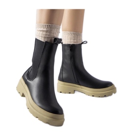 Bottines noires à semelle olive