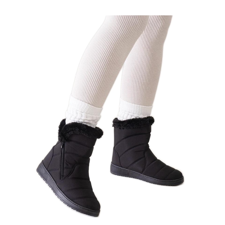 Bottes de neige noires ornées de fourrure le noir