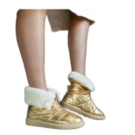 Bottes de neige isolées dorées avec col d'or