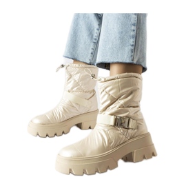 Bottes de neige laquées beiges