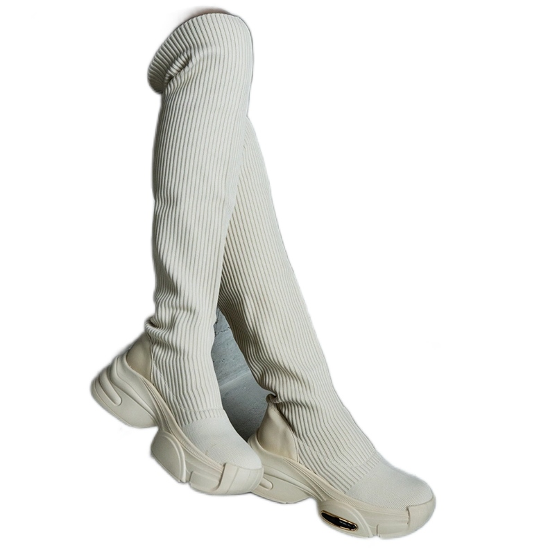 Boots à enfiler beiges à tige souple et semelle massive Boots à enfiler beiges à tige souple et semelle massive