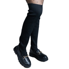 Boots noires à tige souple et talon plat