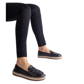Espadrilles glissantes noires sur la plate-forme