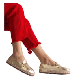 Espadrilles glissantes en or sur la plate-forme doré